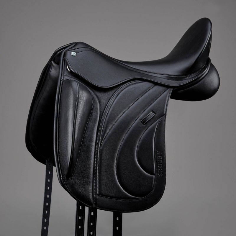 Black Crosby dressage saddle with detailed stitching.