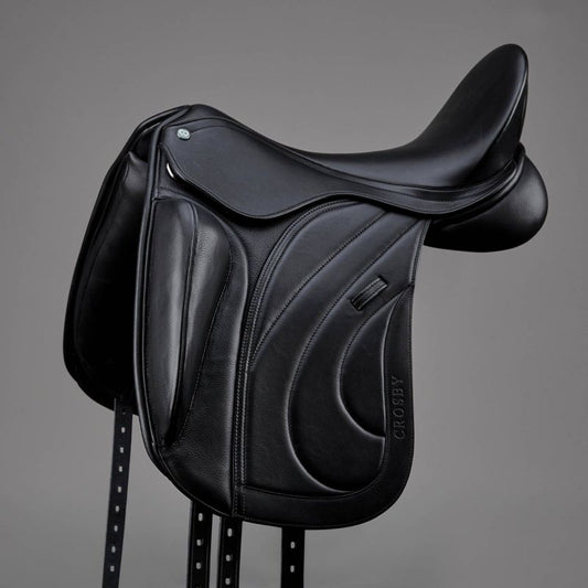 Black leather Crosby dressage saddle with detailed stitching.