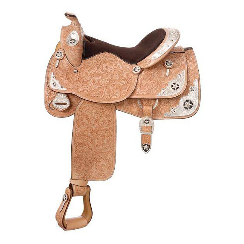 Ornate tan western saddle with intricate silver embellishments.