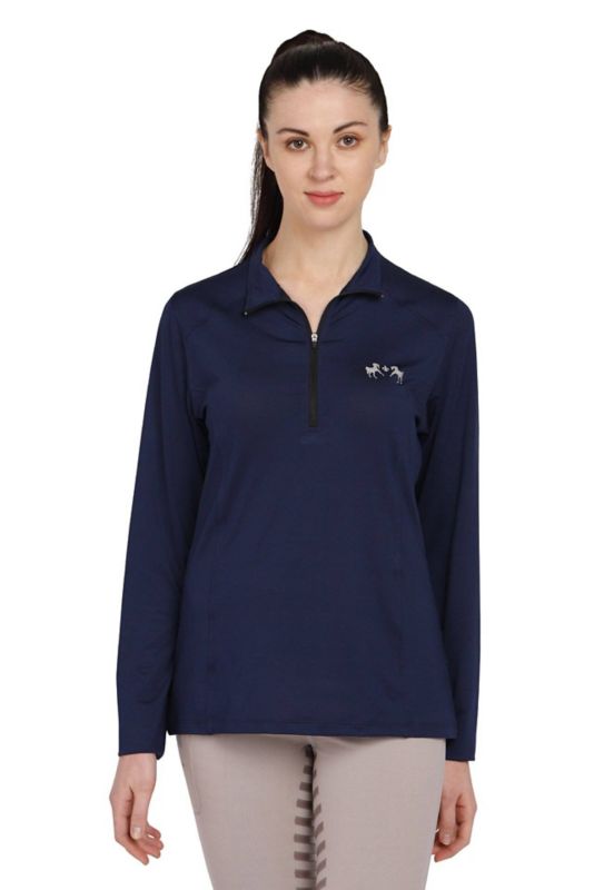 Woman wearing navy blue Tuffrider long-sleeve zip-up shirt.