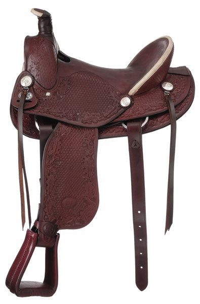 Brown leather western saddle with intricate floral embossing details.