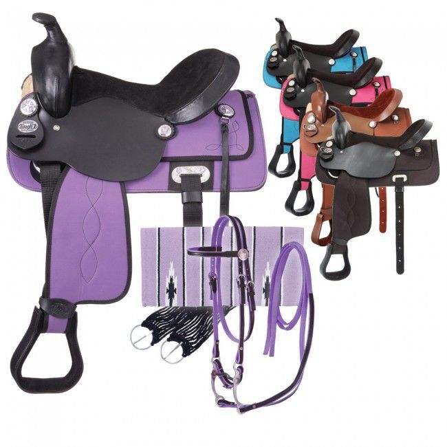 Colorful western saddle sets including bridles, pads, and reins.