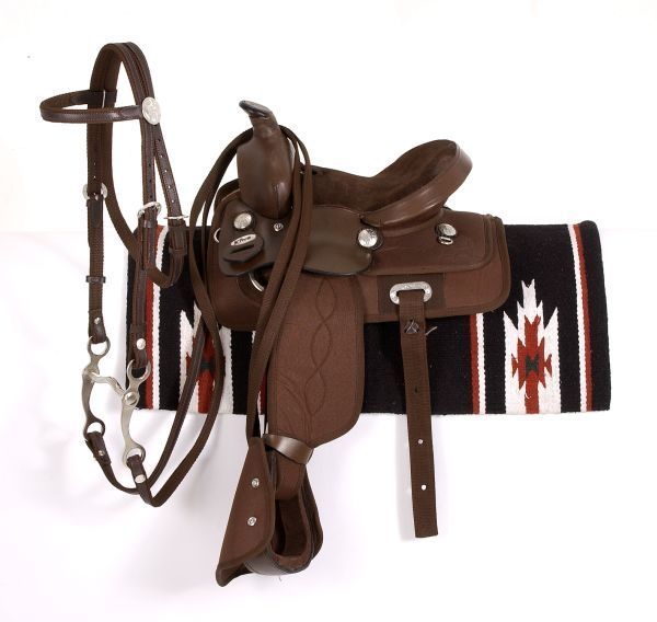 Brown leather western saddle on colorful patterned saddle blanket.