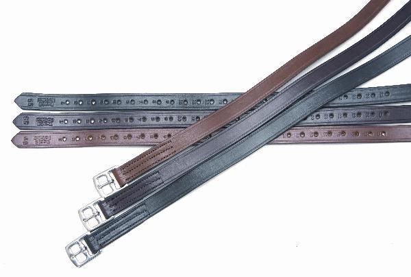 Brown and black stirrup leathers with silver tone buckles.